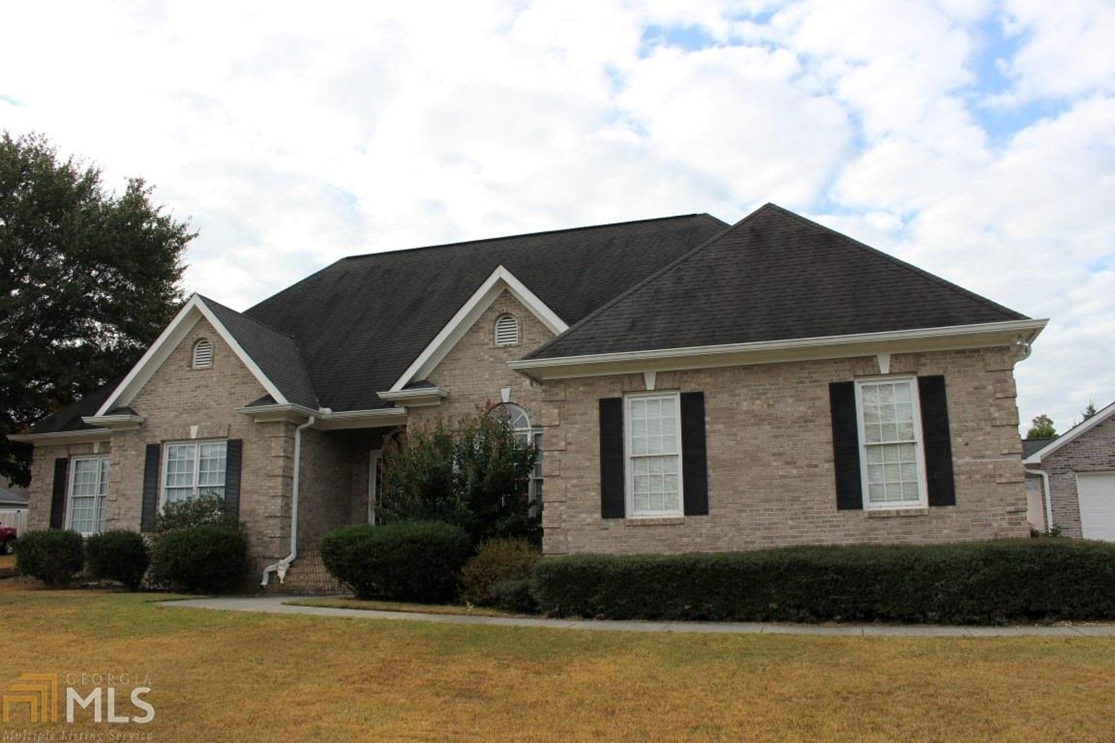 12 Mountain Brook Ridge Southwest, Unit 76 Rome, GA 30165 - Photo 1 of 1 a front view of a house with a yard