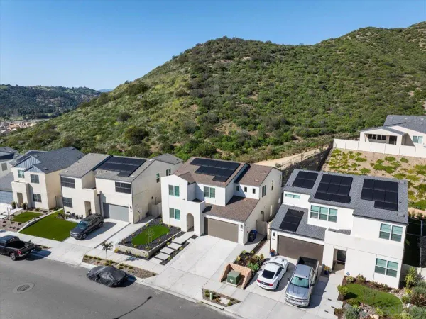 an aerial view of a house with a garden