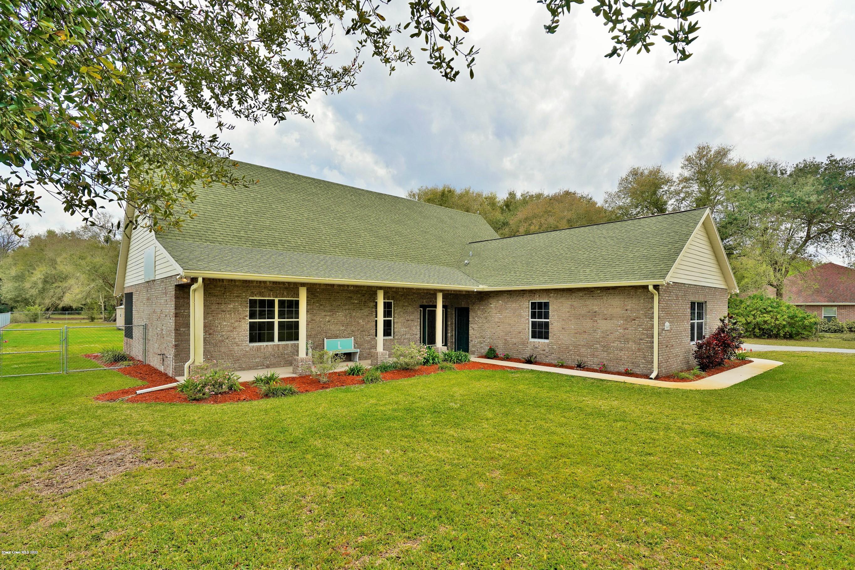3445 Carter Road Mims, FL 32754 - Photo 1 of 38 Front