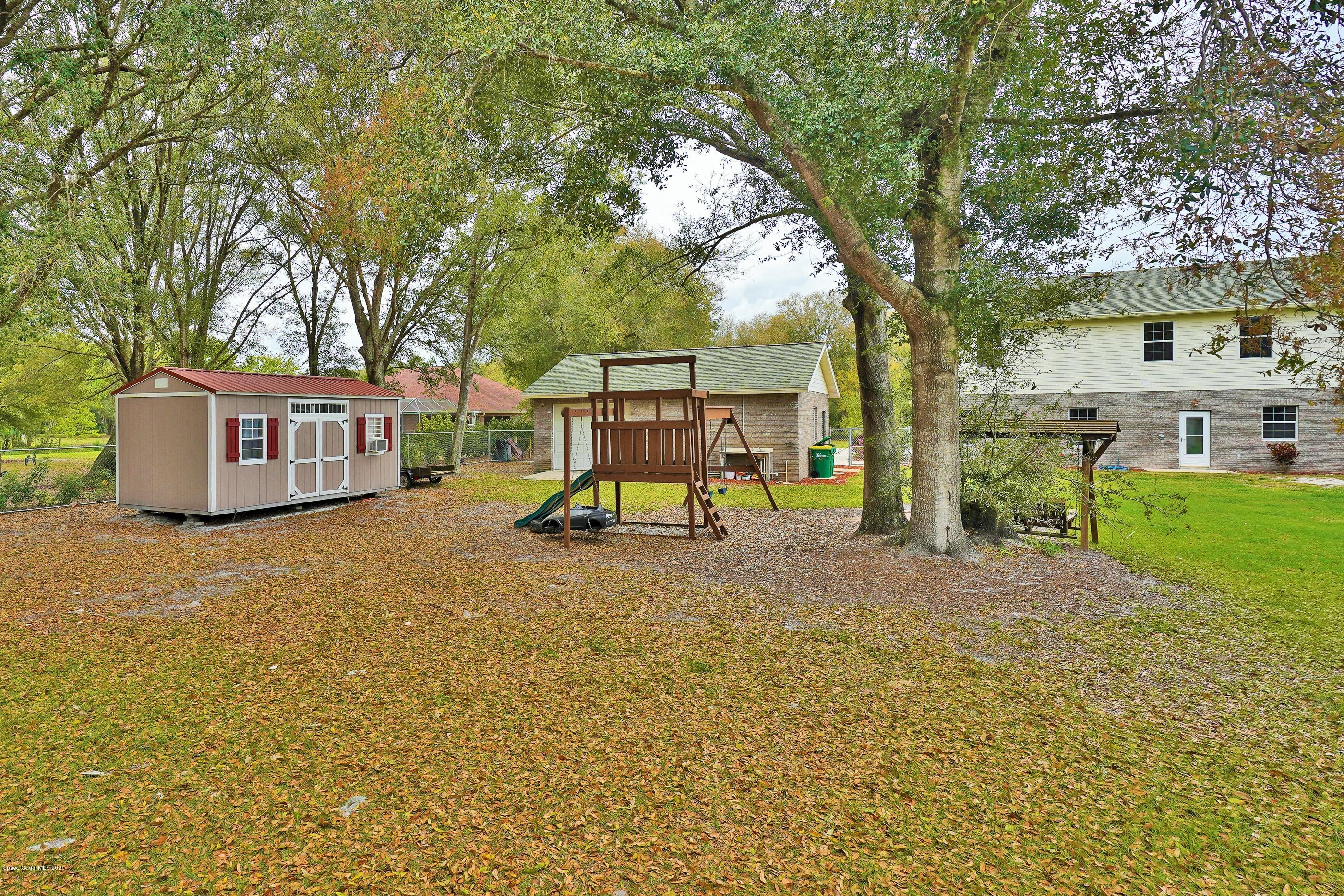 3445 Carter Road Mims, FL 32754 - Photo 7 of 38 Back Yard