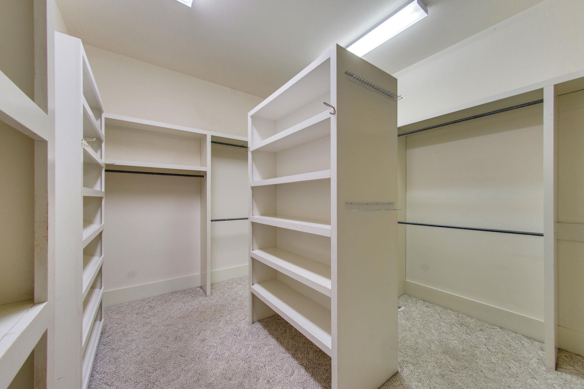1026 Holly Tree Gap Road Brentwood, TN 37027 - Photo 17 of 27 a view of an empty walk in closet