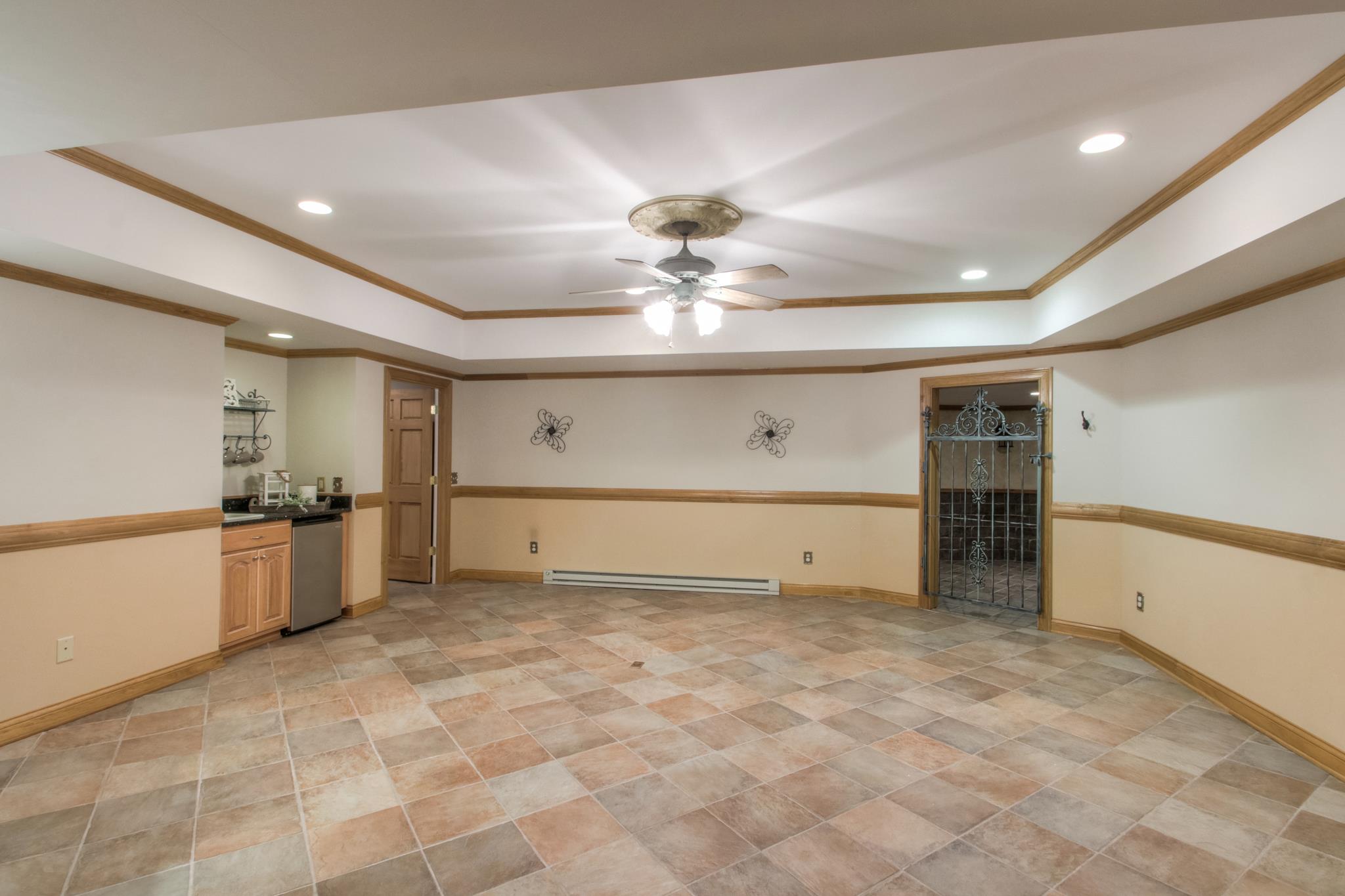1026 Holly Tree Gap Road Brentwood, TN 37027 - Photo 18 of 27 a view of a kitchen with a sink and cabinets