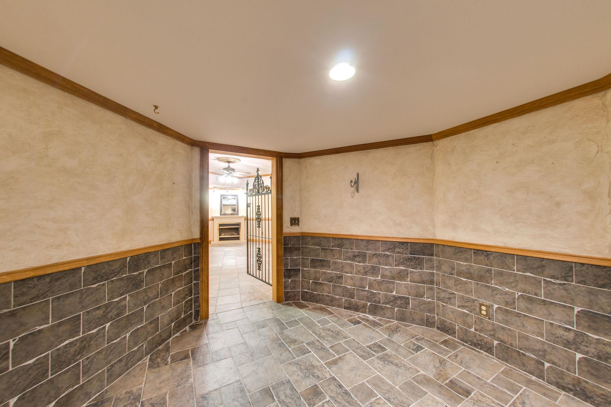1026 Holly Tree Gap Road Brentwood, TN 37027 - Photo 19 of 27 a view of an empty walk in closet