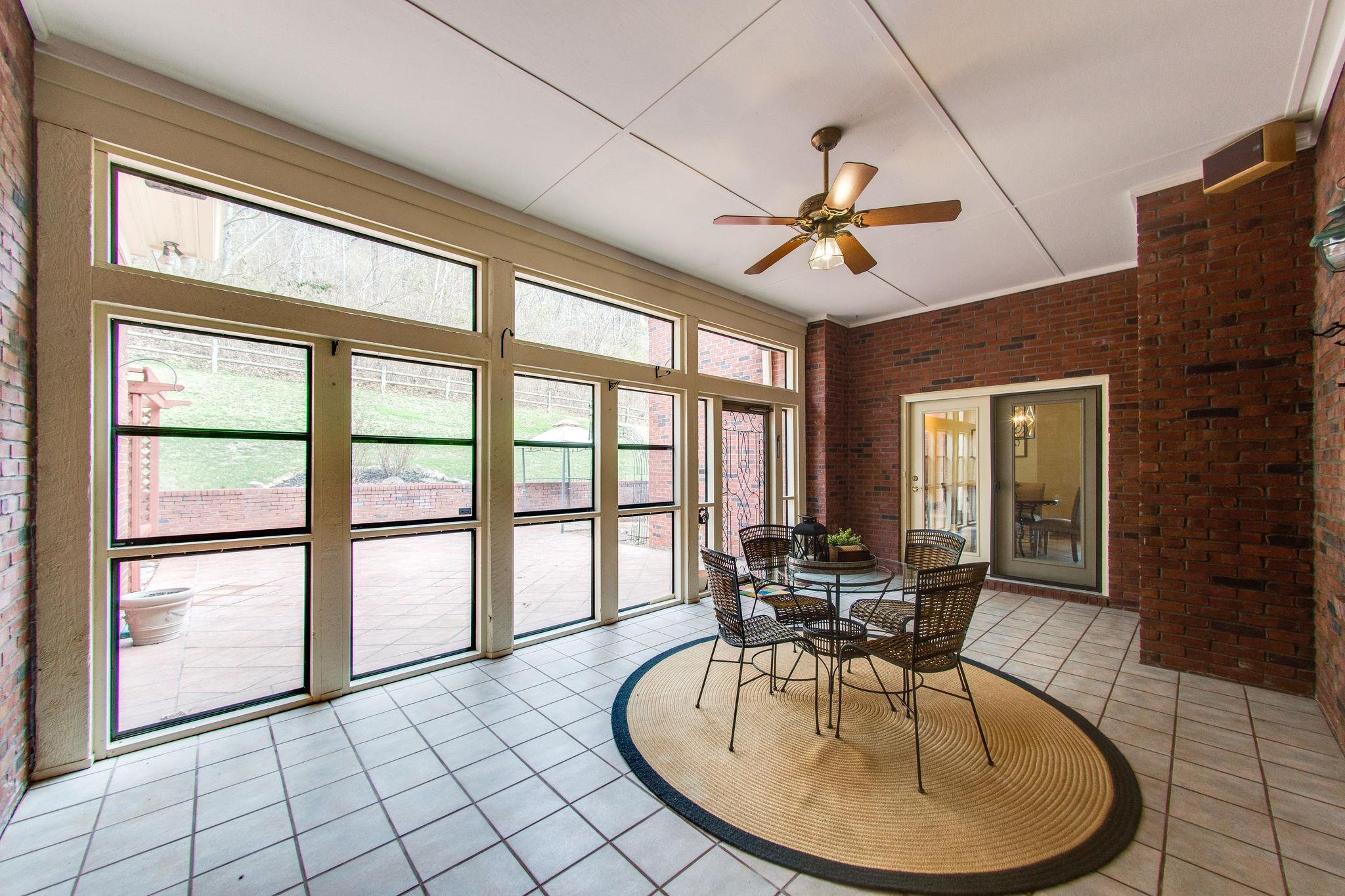 1026 Holly Tree Gap Road Brentwood, TN 37027 - Photo 20 of 27 a view of a dining room with furniture window and outside view