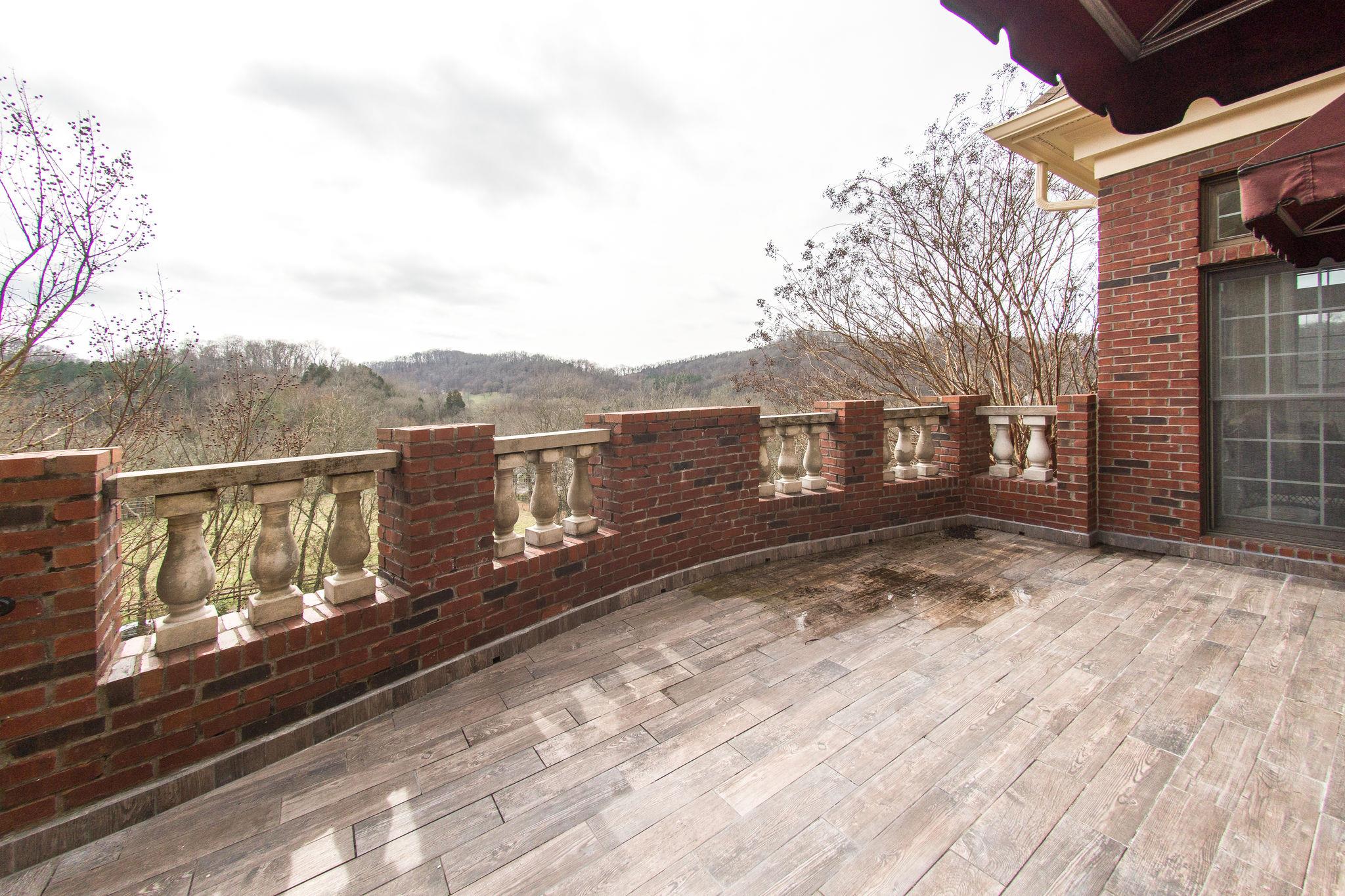 1026 Holly Tree Gap Road Brentwood, TN 37027 - Photo 24 of 27 a view of a house with a street