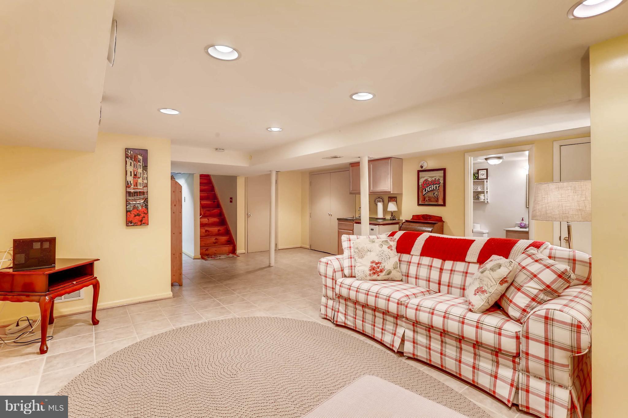 3125 Acton Road Baltimore, MD 21234 - Photo 22 of 28 Basement - Wet Bar Behind Sofa