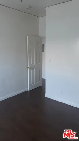 an empty room with a door
