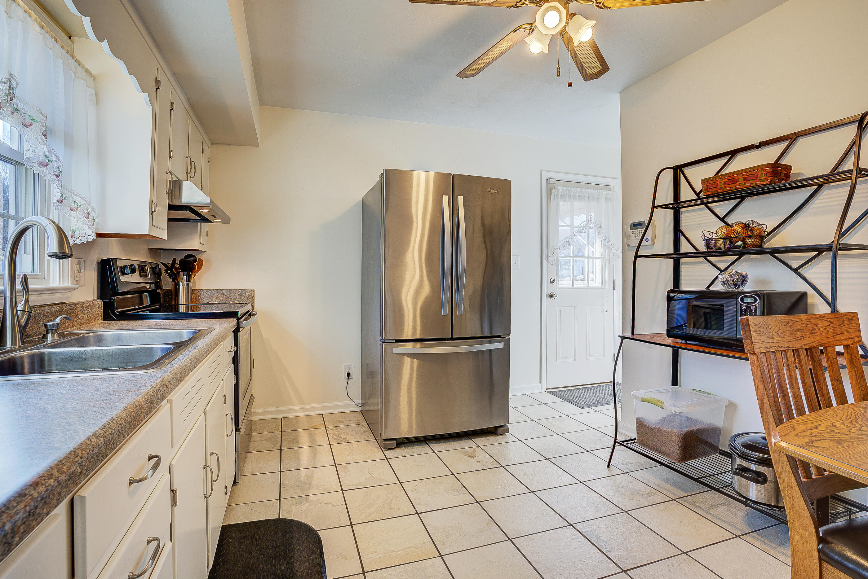 1905 Burma Road Salem, VA 24153 - Photo 10 of 26 a kitchen with stainless steel appliances granite countertop a refrigerator a sink a stove and island