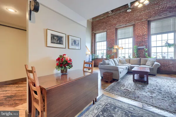 a living room with furniture and a couch