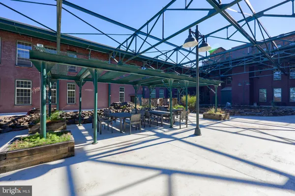 a view of a chairs and tables in patio