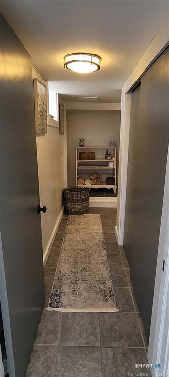 291 High Street Groton, CT 06355 - Photo 16 of 23 Bathroom area has 2 closets for storage, tile bath/shower.