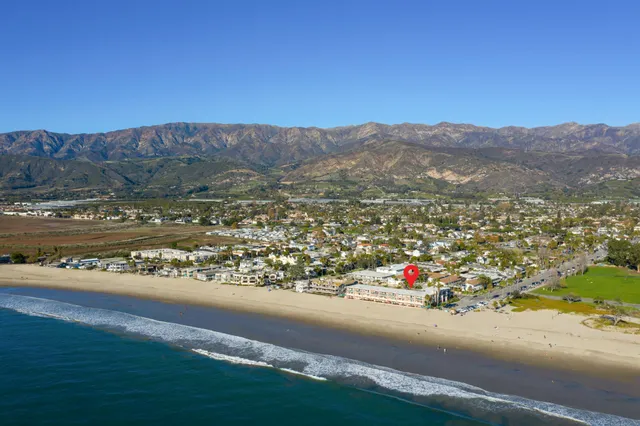 a outdoor space with lots of tables and chairs