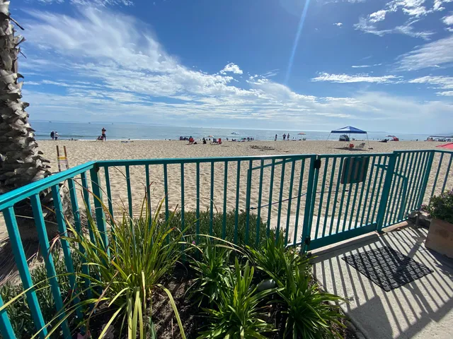 a view of balcony with wooden floor