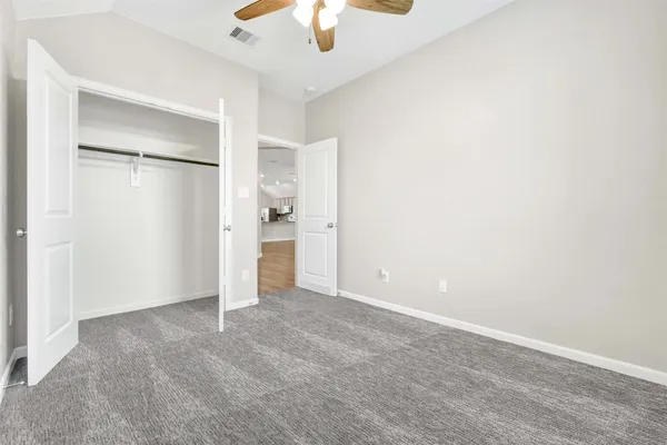 an empty room with a bathroom