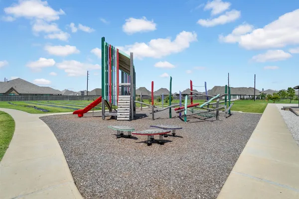 a view of a park with swings