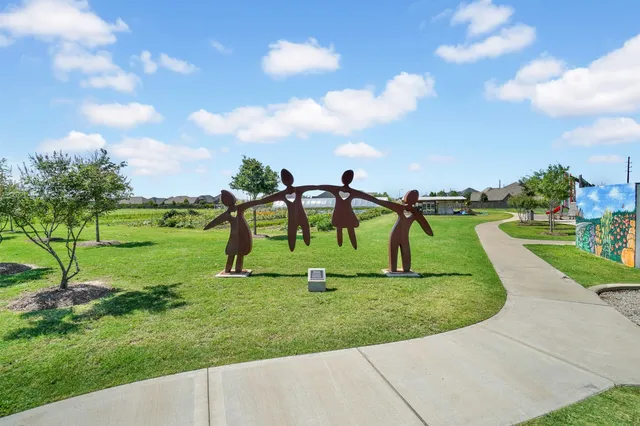 a view of a park with swings