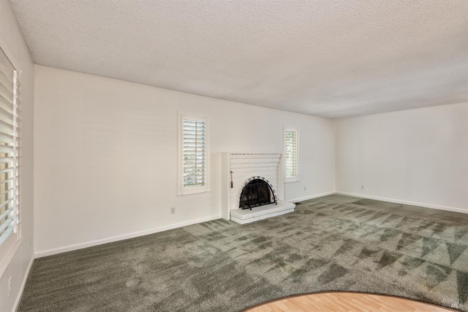 826 Adobe Drive Santa Rosa, CA 95404 - Photo 13 of 32 a view of empty room with a fireplace