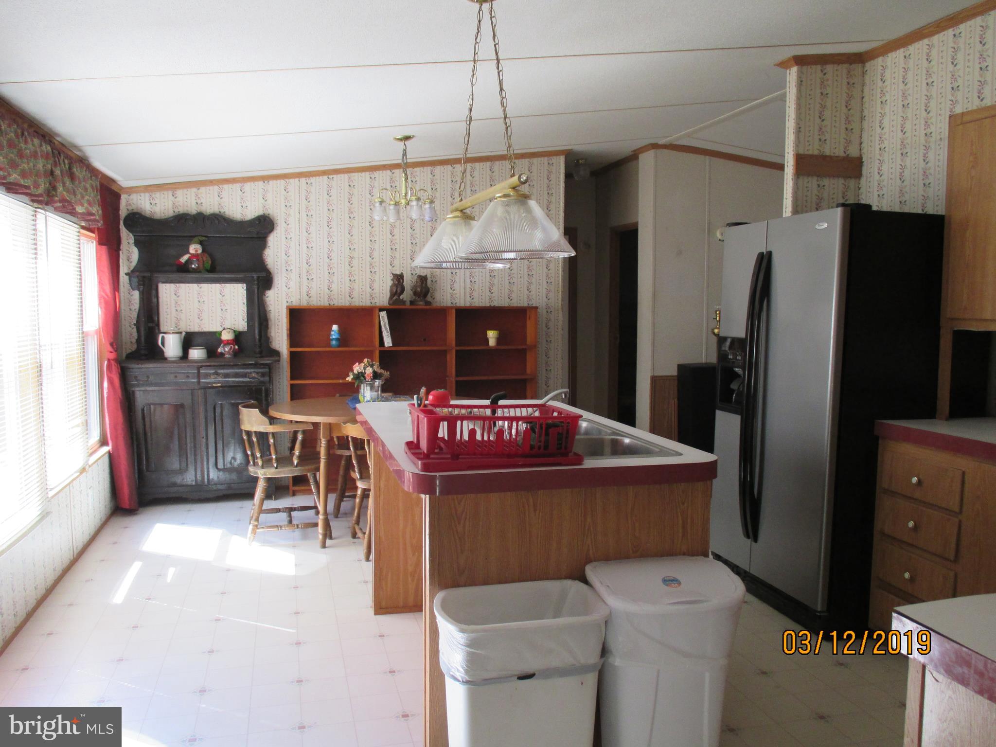 131 Virginia Line Road Berkeley Springs, WV 25411 - Photo 8 of 15 kitchen/dining room