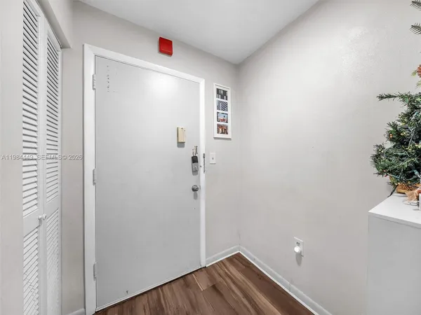 a very nice looking room with wooden floor