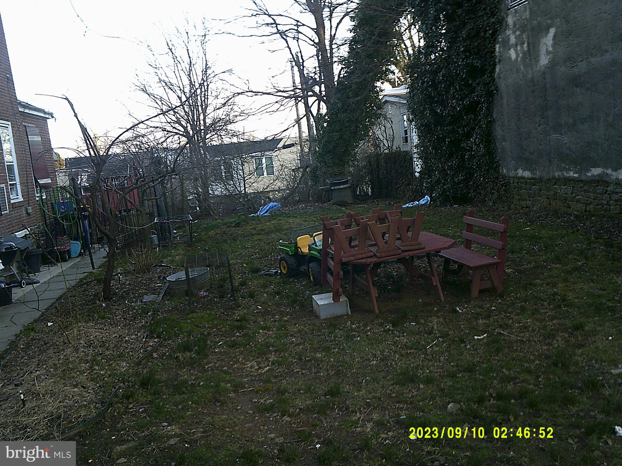 420 High Street Philadelphia, PA 19144 - Photo 2 of 3 a backyard of a house with table and chairs