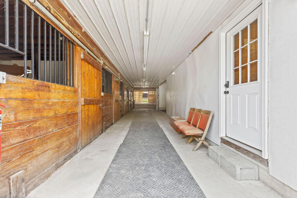 10389 Center Village Road, Unit A Galena, OH 43021 - Photo 35 of 39 Back door of barndominium which accesses through aiselway of barn.
