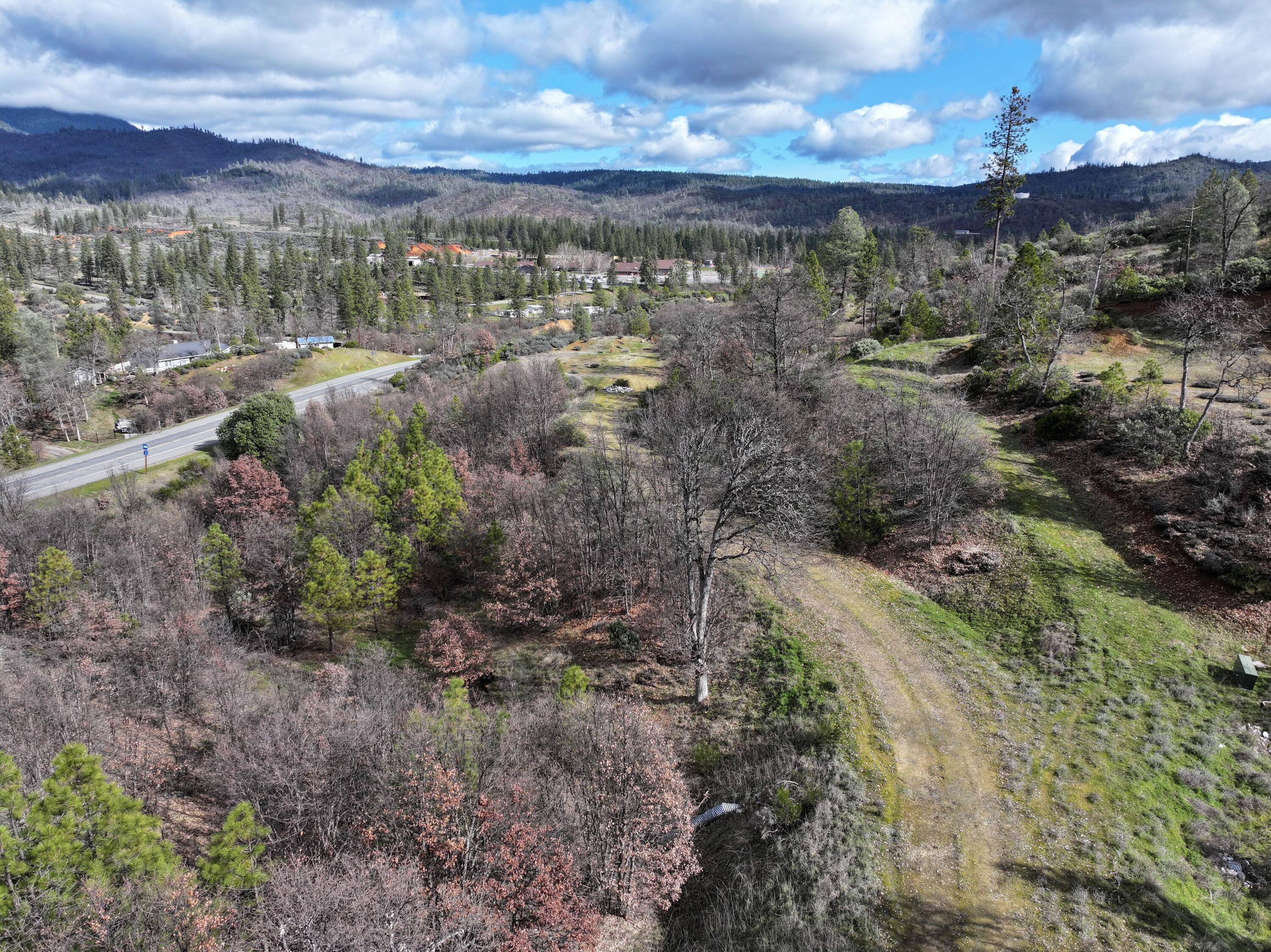 160 Trinco Road Weaverville, CA 96093 - Photo 30 of 51 a view of a lake with mountains and covered by side of mountain