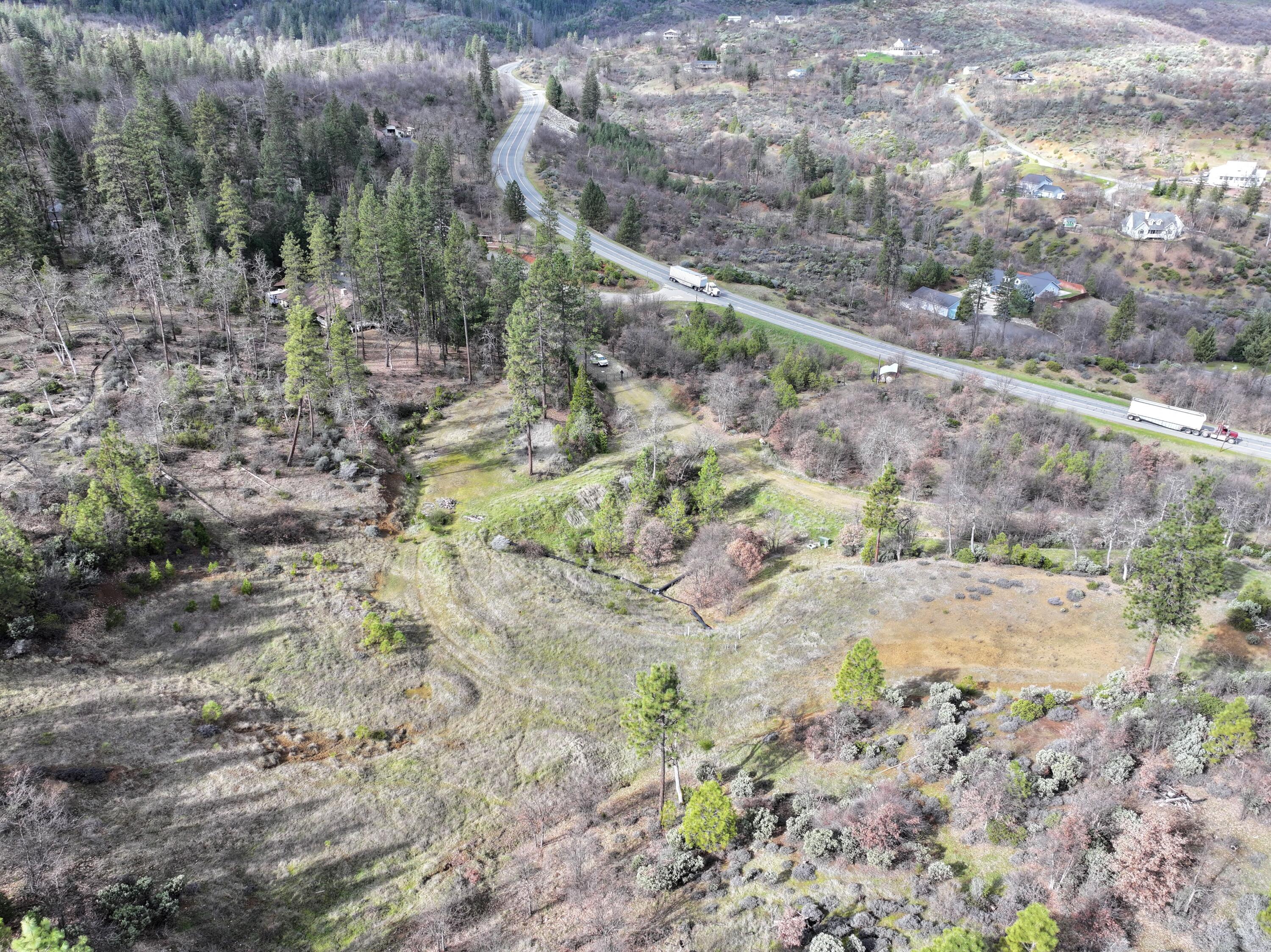 160 Trinco Road Weaverville, CA 96093 - Photo 4 of 51 a view of a dry field with lots of trees