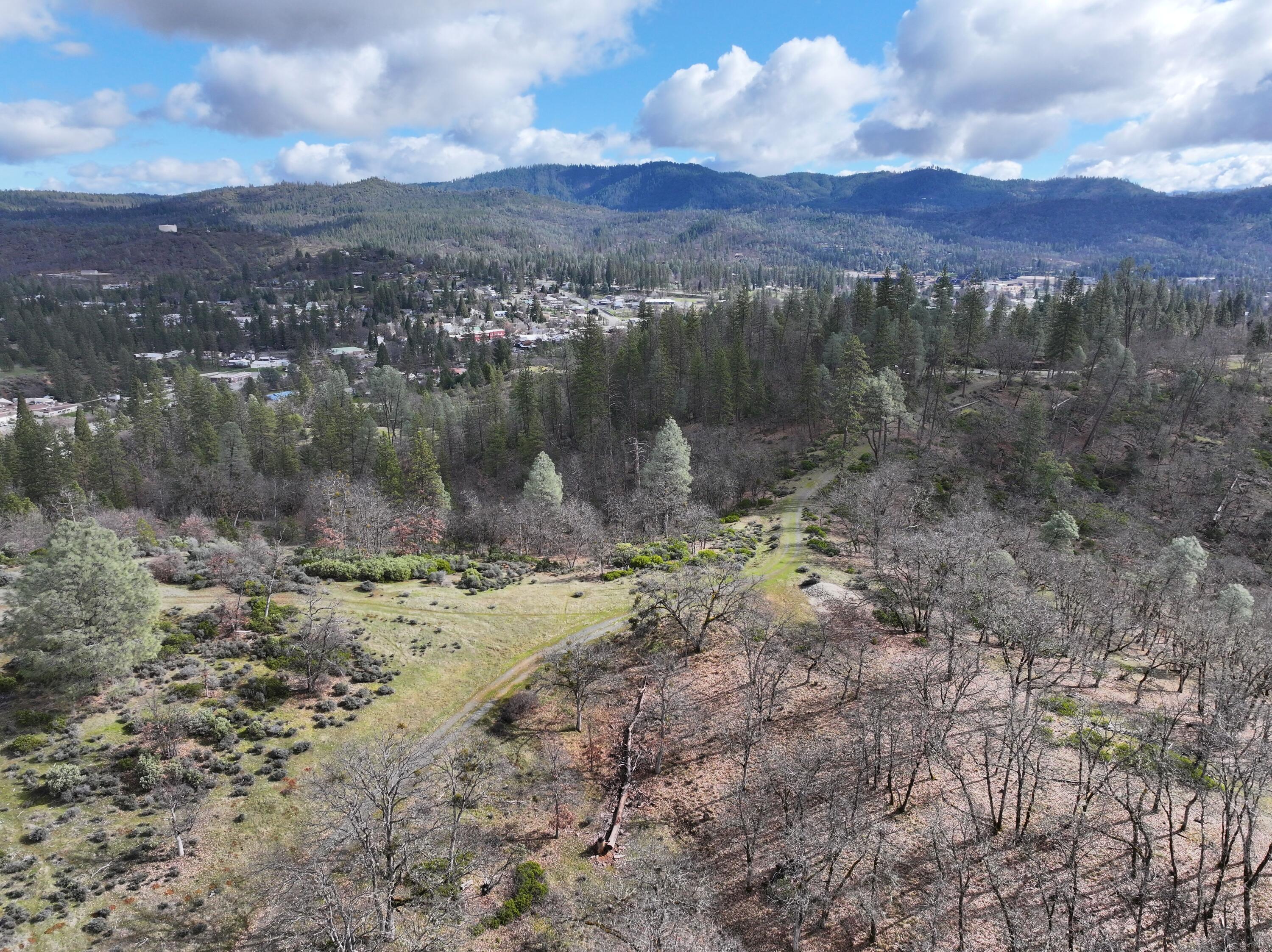 160 Trinco Road Weaverville, CA 96093 - Photo 8 of 51 a view of a lake with mountains in the background