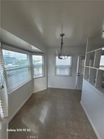 a view of a room with a sink and a window