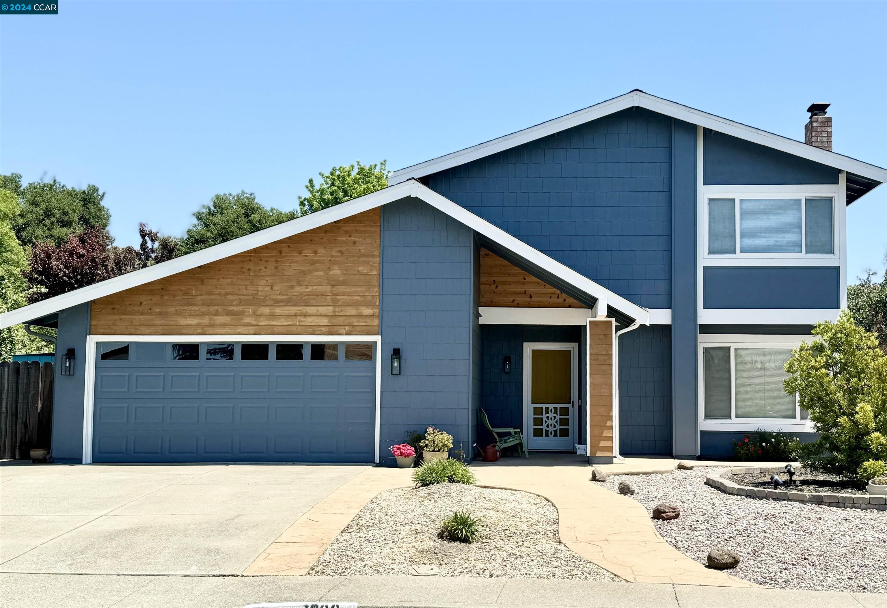 1089 Seascape Circle Rodeo, CA 94572 - Photo 1 of 1 a front view of a house with a yard