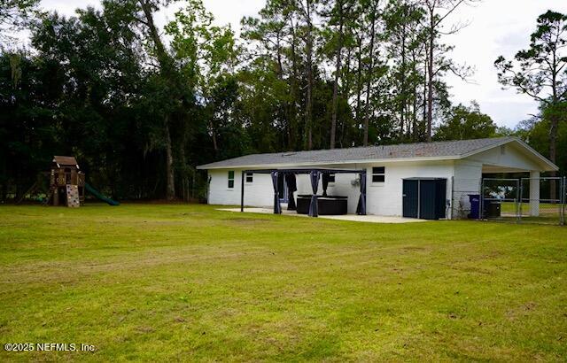 54376 Lisa Drive Callahan, FL 32011 - Photo 24 of 32 a front of house with a garden