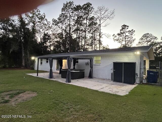 54376 Lisa Drive Callahan, FL 32011 - Photo 26 of 32 a view of a house with a yard and sitting area