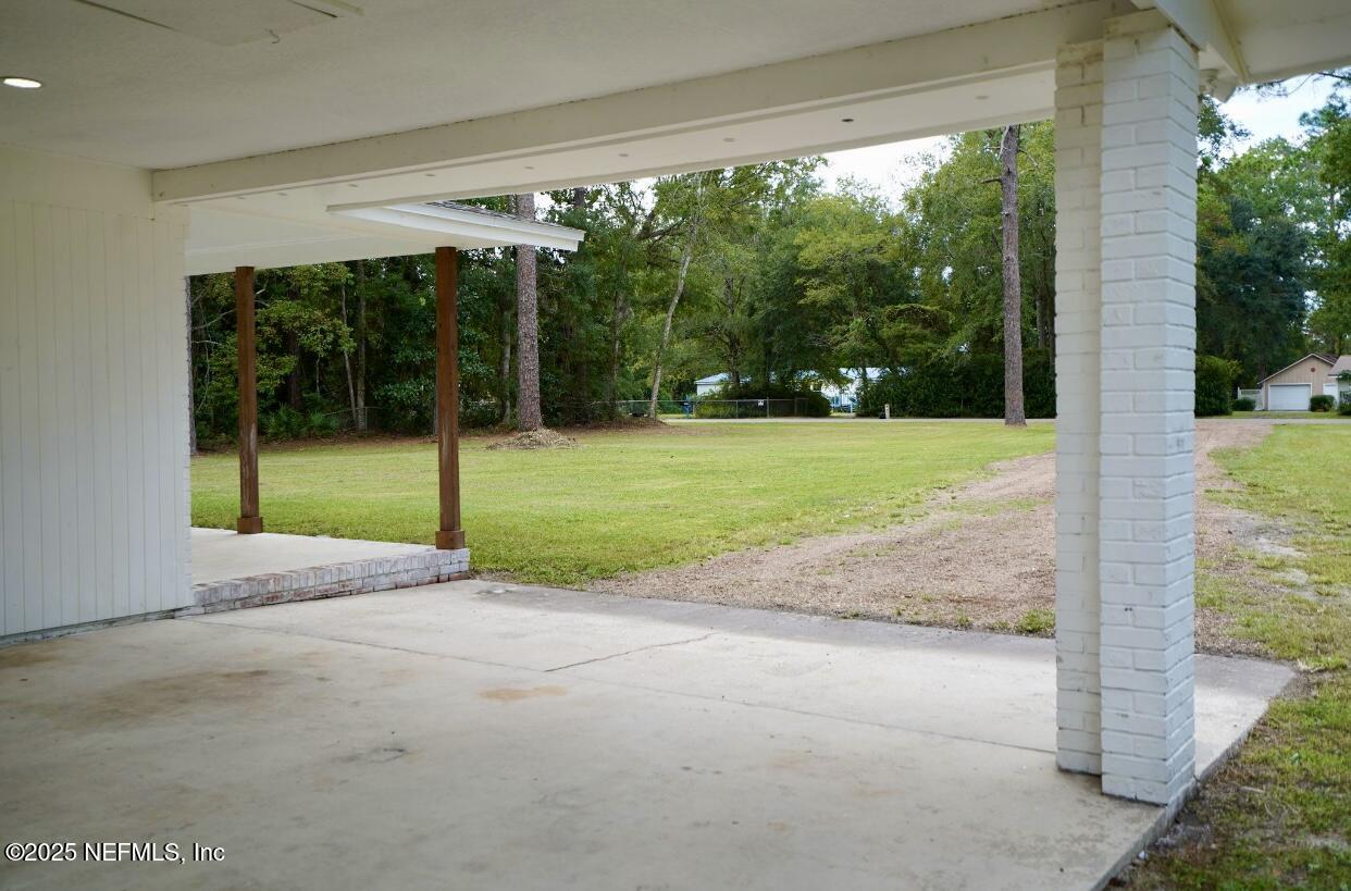 54376 Lisa Drive Callahan, FL 32011 - Photo 6 of 32 a view of a room with porch and garden