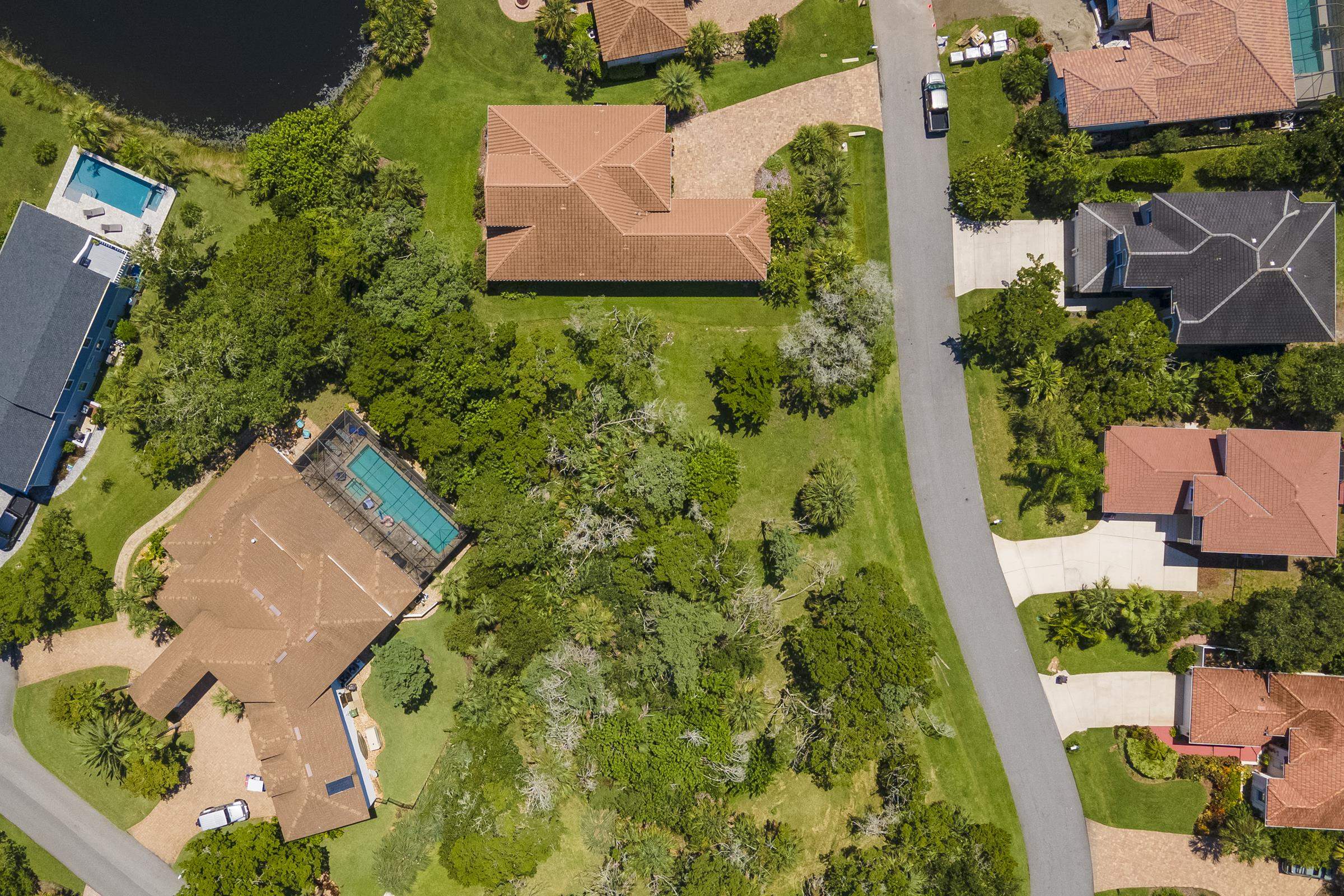an aerial view of house with yard