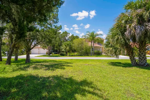 a view of swimming pool and outdoor seating