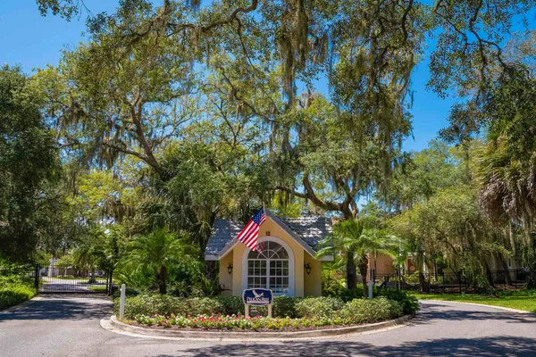 a house with trees in front of it