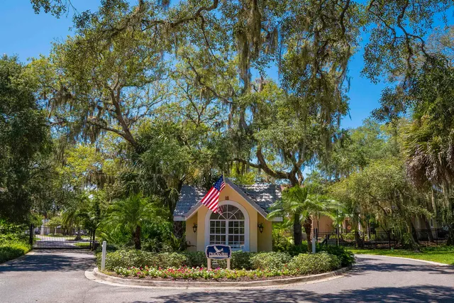 a house with trees in front of it