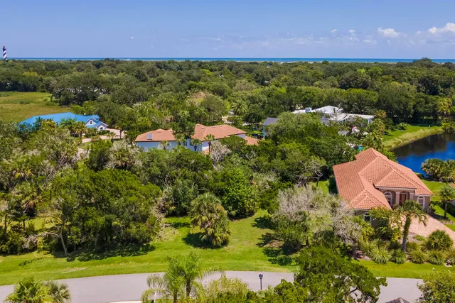 a view of a garden with a lake
