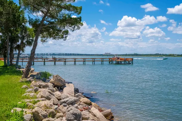 a view of swimming pool from a balcony