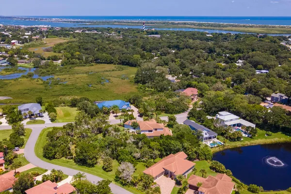 a view of a city and mountains ocean view