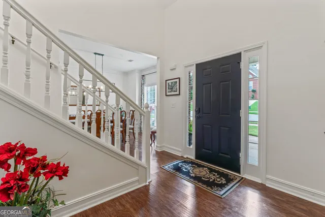 a living room with stairs