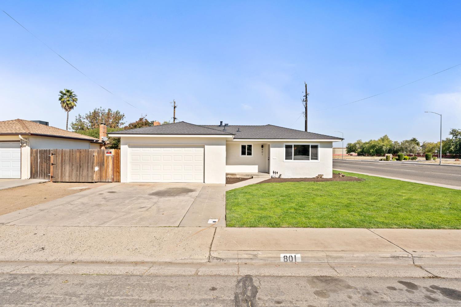 a view of a yard in front of a house