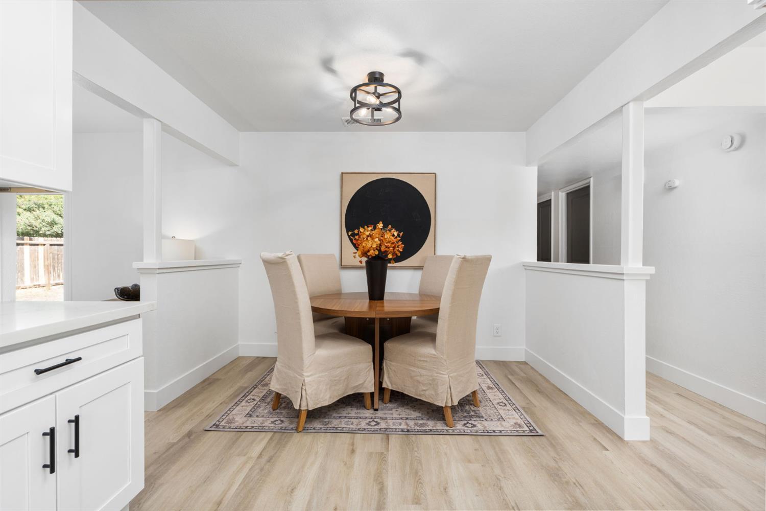 801 West Santa Ana Avenue Clovis, CA 93612 - Photo 17 of 32 a view of a dining room with a table and chairs