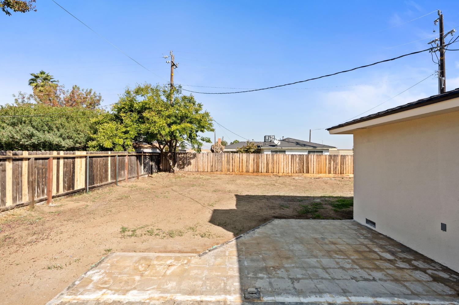801 West Santa Ana Avenue Clovis, CA 93612 - Photo 26 of 32 a view of a porch with a yard
