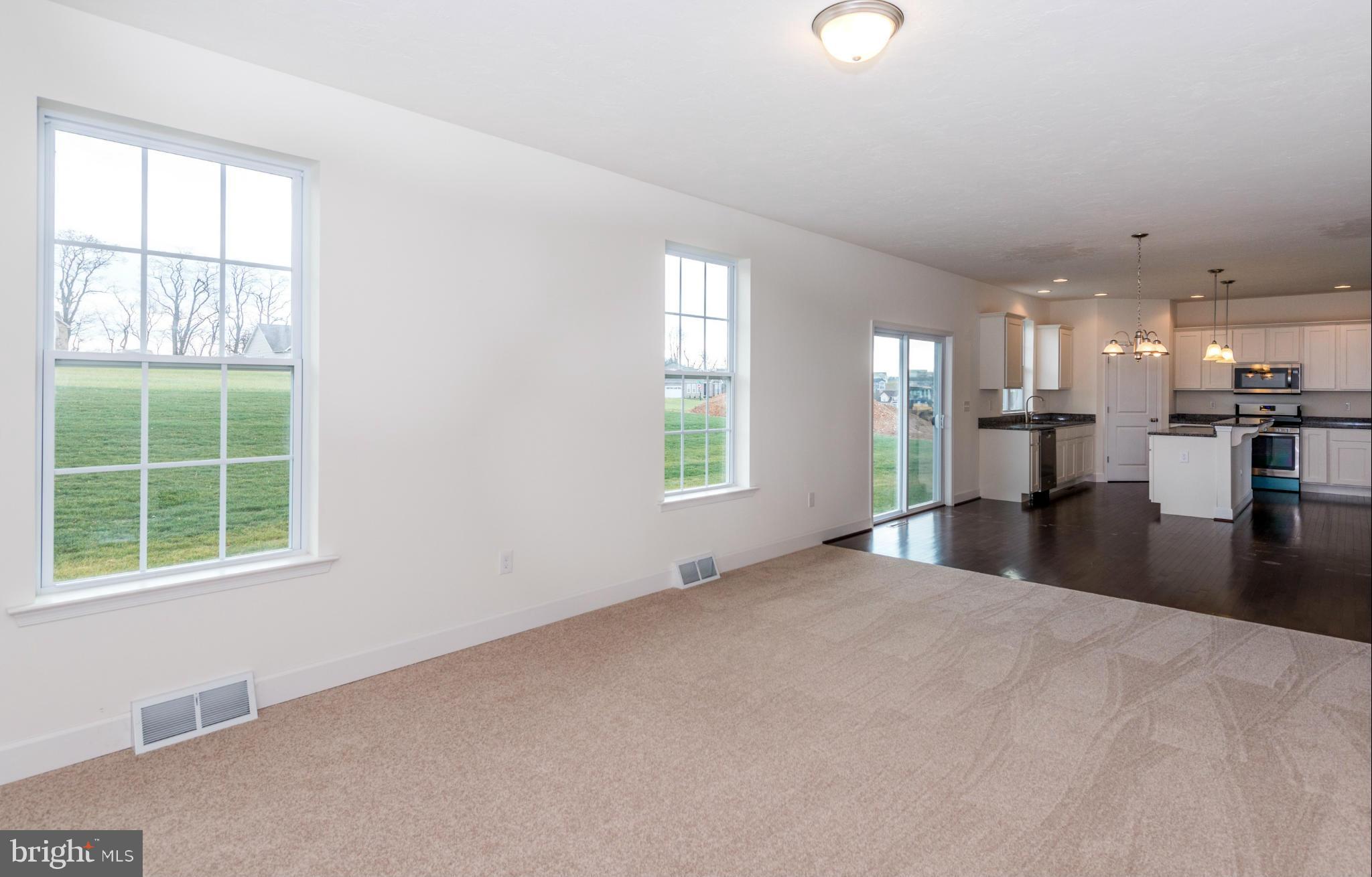 1194 Bair Road, Unit 39 Hanover, PA 17331 - Photo 6 of 12 a view of a kitchen with a sink and a window