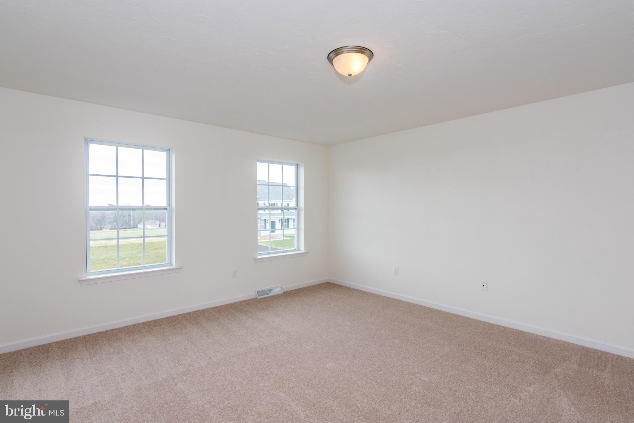 1194 Bair Road, Unit 39 Hanover, PA 17331 - Photo 7 of 12 an empty room with windows