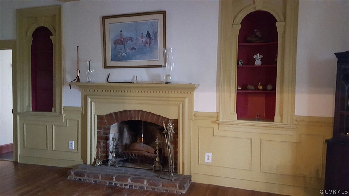 3170 Duke Road Powhatan, VA 23139 - Photo 5 of 27 Formal living room with wainscotting, custom mantl