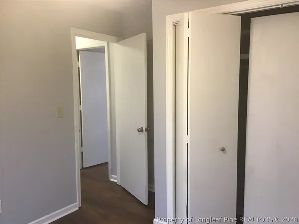 a view of a bathroom with mirror