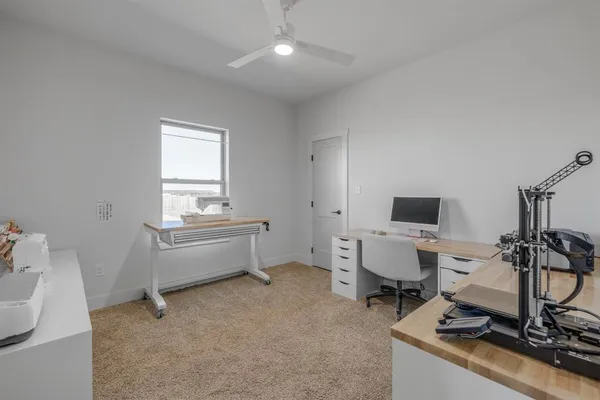 a bedroom with a bed and furniture