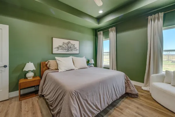 a bathroom with a double vanity sink mirror and a